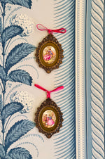 Load image into Gallery viewer, Pair of Framed Elegant Porcelain Cameos
