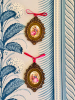 Load image into Gallery viewer, Pair of Framed Elegant Porcelain Cameos
